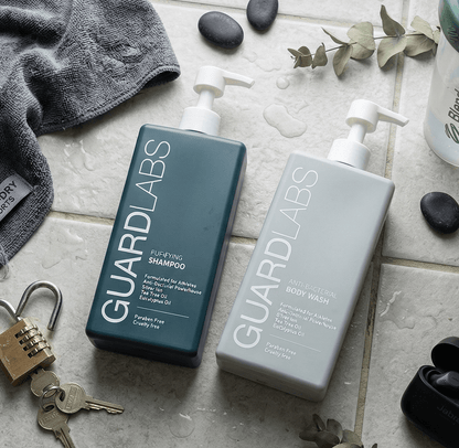 Guard Labs purifying shampoo and antibacterial body wash bundle flatlay